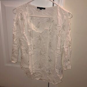 Size small white top with green palm trees